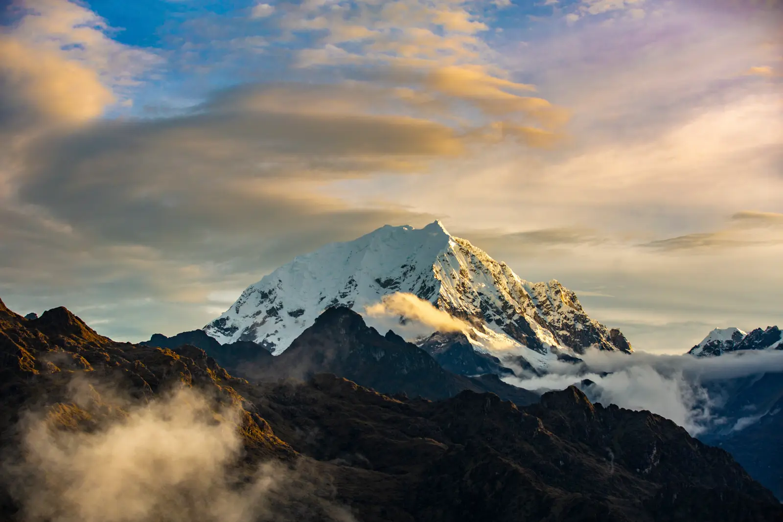 Snow-covered Andean mountain at sunrise