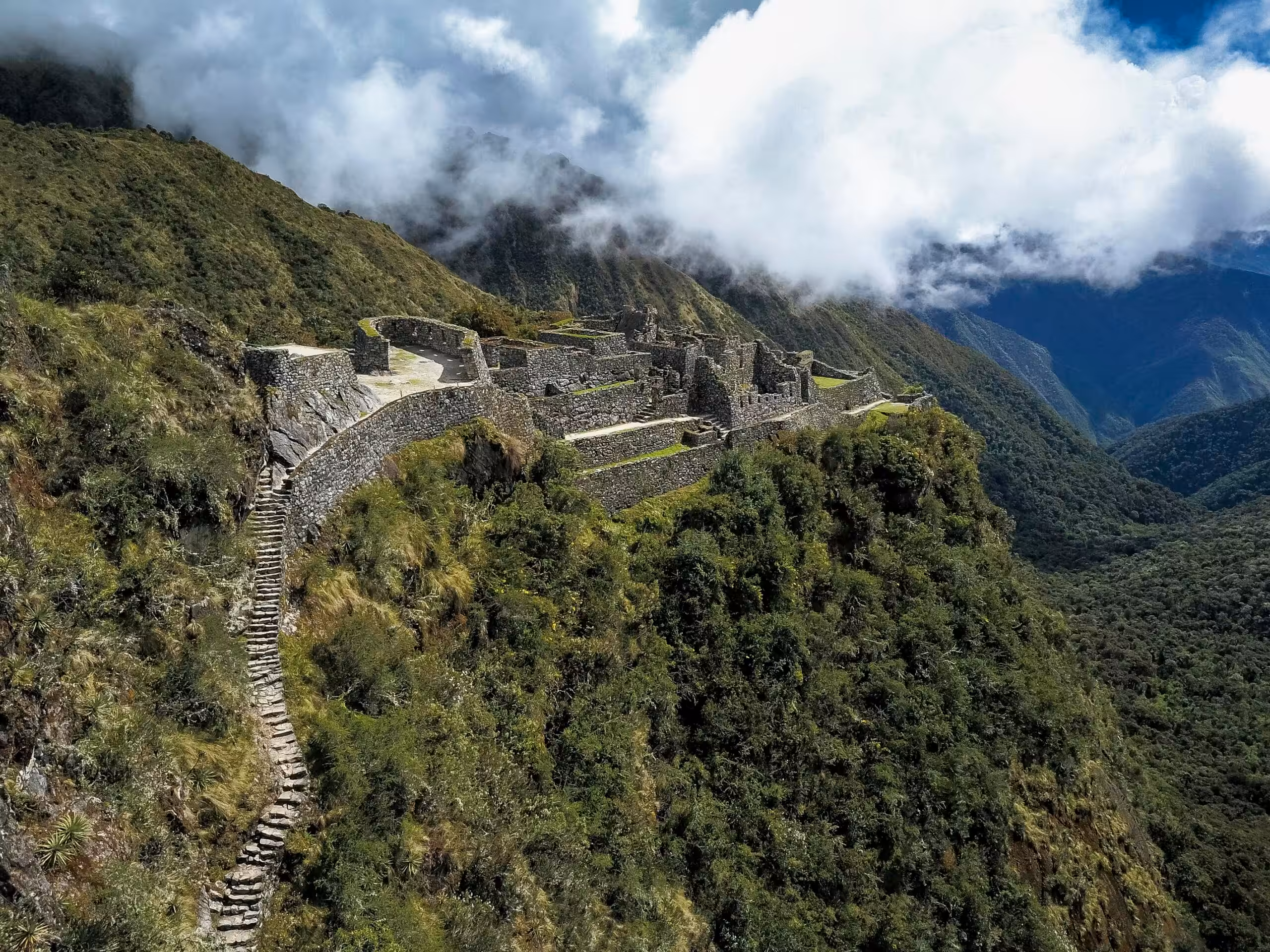 The Inca Trail ruins of Sayacmarca beneath the Andes